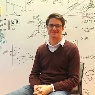 A professional headshot of online UW MSIM faculty member, Bill Howe