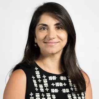 A professional headshot of online UW MSIM faculty member, Hala Annabi